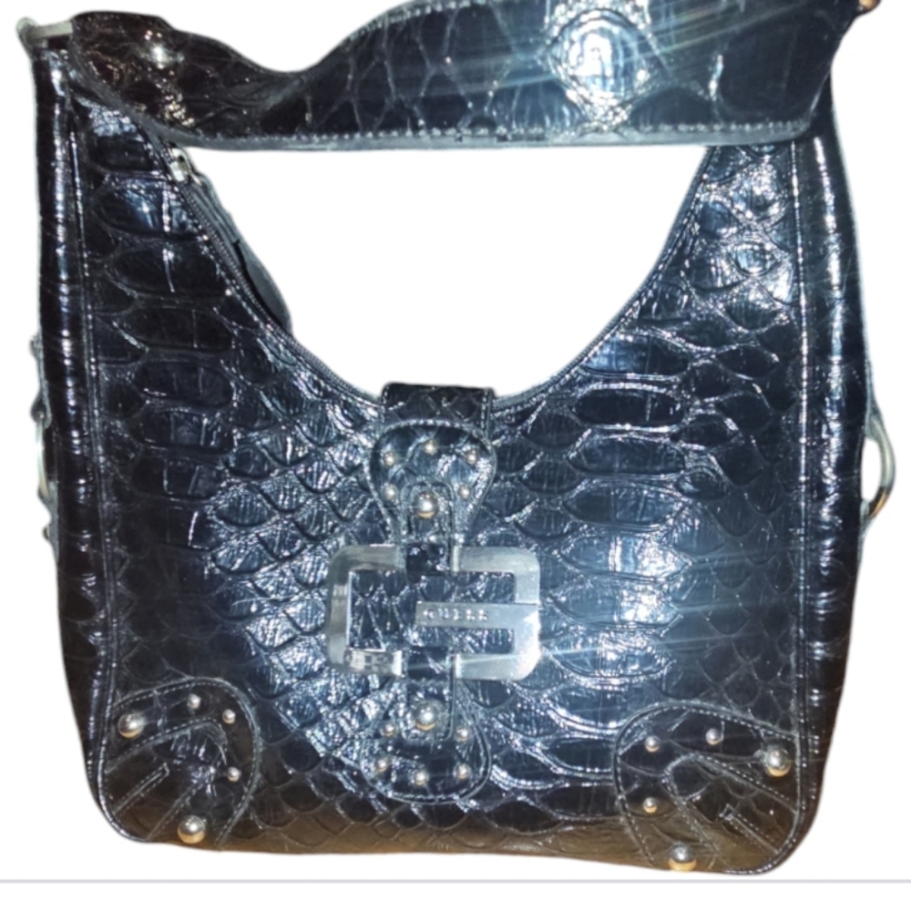 Guess black purse. W14"XH10" zipper closure EUC great condition. Tan inside